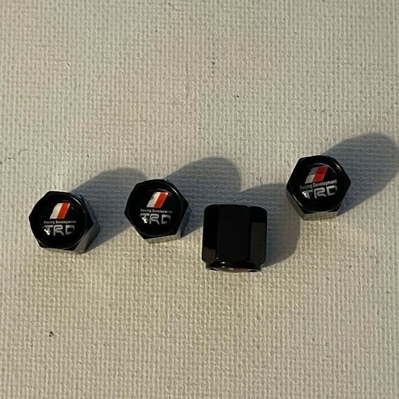 Toyota TRD valve Stem caps in Black NWT set of 4 NWT - Picture 1 of 4
